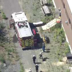 Aerial view of first responders at a metal fabrication facility
